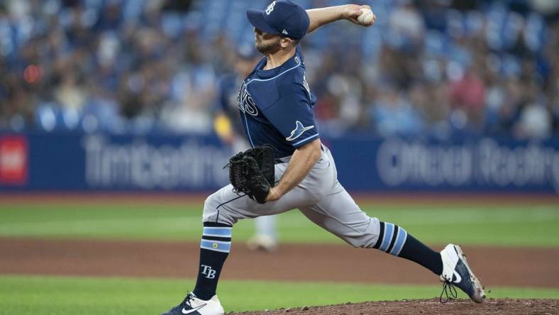 Sep 13, 2022; Toronto, Ontario, CAN; Tampa Bay Rays relief pitcher Kevin Herget (44) throws a pitch against the Toronto Blue Jays during the seventh inning at Rogers Centre. Mandatory Credit: Nick Turchiaro-USA TODAY Sports