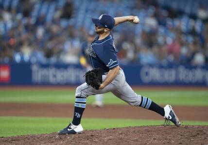 Sep 13, 2022; Toronto, Ontario, CAN; Tampa Bay Rays relief pitcher Kevin Herget (44) throws a pitch against the Toronto Blue Jays during the seventh inning at Rogers Centre. Mandatory Credit: Nick Turchiaro-USA TODAY Sports