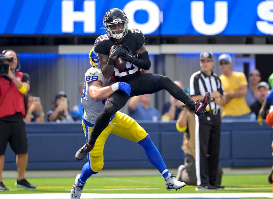 Sep 18, 2022; Inglewood, California, USA;  Atlanta Falcons cornerback Casey Hayward (29) intercepts a pass in the end zone intended for Los Angeles Rams tight end Tyler Higbee (89) in the second quarter at SoFi Stadium. Mandatory Credit: Jayne Kamin-Oncea-USA TODAY Sports