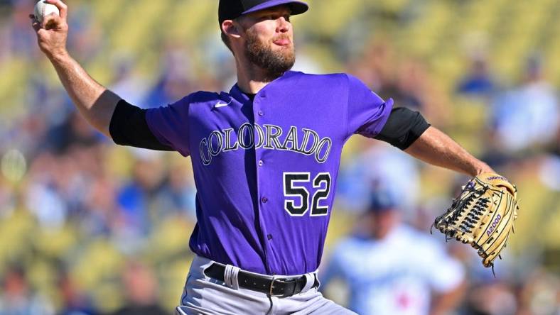 Oct 2, 2022; Los Angeles, California, USA;  Colorado Rockies relief pitcher Daniel Bard (52) earns a save in the ninth inning against the Colorado Rockies at Dodger Stadium. Mandatory Credit: Jayne Kamin-Oncea-USA TODAY Sports