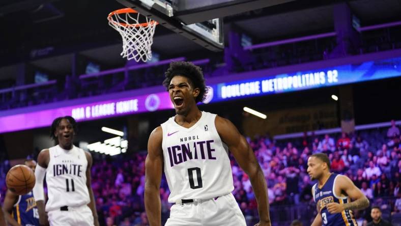 Oct 4, 2022; Henderson, NV, USA;  NBA G League Ignite guard Scoot Henderson (0) reacts after scoring a layup during the second quarter against the Boulogne-Levallois Metropolitans 92 at The Dollar Loan Center. Mandatory Credit: Lucas Peltier-USA TODAY Sports