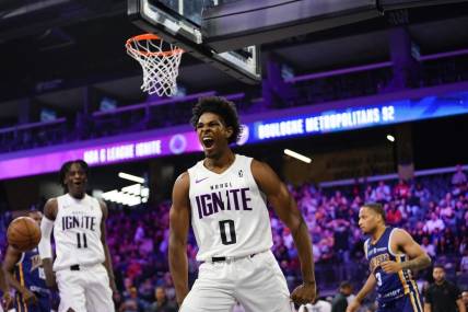 Oct 4, 2022; Henderson, NV, USA;  NBA G League Ignite guard Scoot Henderson (0) reacts after scoring a layup during the second quarter against the Boulogne-Levallois Metropolitans 92 at The Dollar Loan Center. Mandatory Credit: Lucas Peltier-USA TODAY Sports