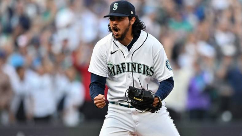 Oct 15, 2022; Seattle, Washington, USA; Seattle Mariners relief pitcher Andres Munoz (75) reacts in the eighth inning against the Houston Astros during game three of the ALDS for the 2022 MLB Playoffs at T-Mobile Park. Mandatory Credit: Steven Bisig-USA TODAY Sports