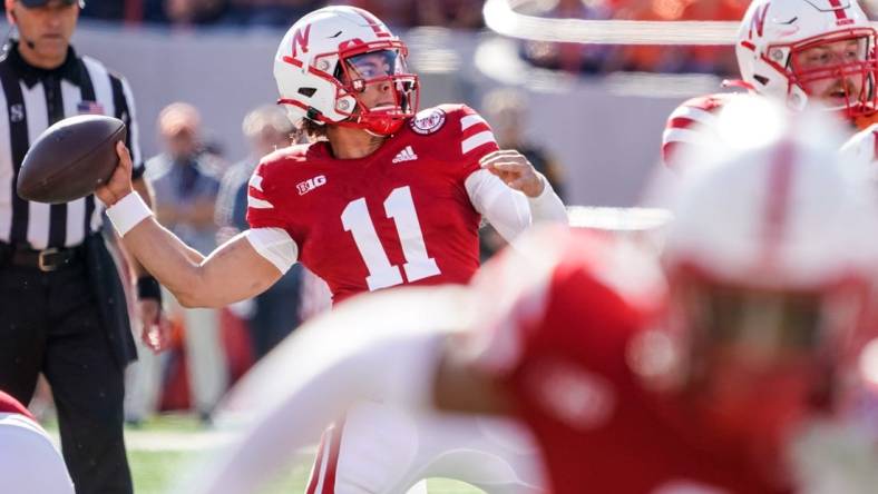 Oct 29, 2022; Lincoln, Nebraska, USA; Nebraska Cornhuskers quarterback Casey Thompson (11) passes against the Illinois Fighting Illini during the first quarter at Memorial Stadium. Mandatory Credit: Dylan Widger-USA TODAY Sports