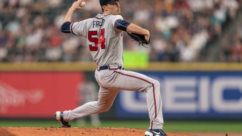 Atlanta Braves starter Max Fried (54) delivers a pitch against the Seattle Mariners at T-Mobile Park. Mandatory Credit: Stephen Brashear-USA TODAY Sports