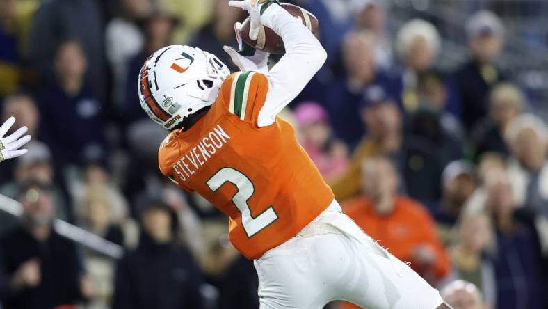 Nov 12, 2022; Atlanta, Georgia, USA; Miami Hurricanes cornerback Tyrique Stevenson (2) intercepts a pass against the Georgia Tech Yellow Jackets in the second half at Bobby Dodd Stadium. Mandatory Credit: Brett Davis-USA TODAY Sports