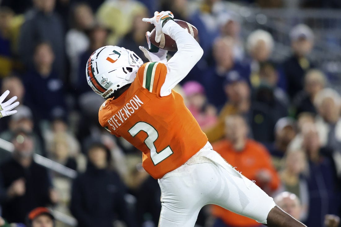 Nov 12, 2022; Atlanta, Georgia, USA; Miami Hurricanes cornerback Tyrique Stevenson (2) intercepts a pass against the Georgia Tech Yellow Jackets in the second half at Bobby Dodd Stadium. Mandatory Credit: Brett Davis-USA TODAY Sports