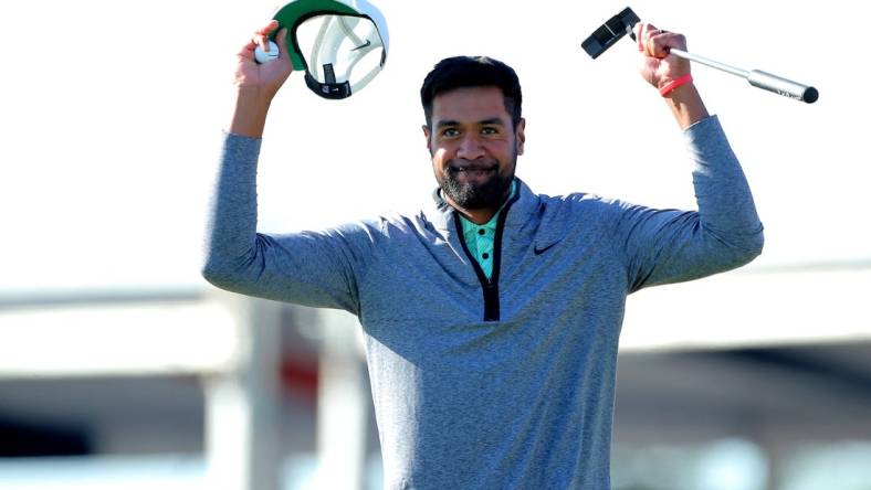 Nov 13, 2022; Houston, Texas, USA; Tony Finau celebrates after winning the Cadence Bank Houston Open golf tournament. Mandatory Credit: Erik Williams-USA TODAY Sports