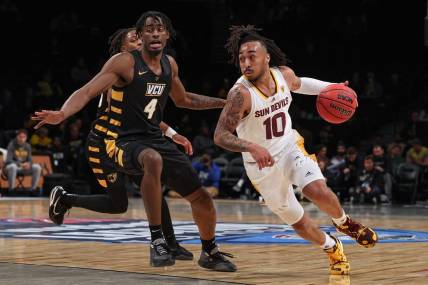 Nov 16, 2022; Brooklyn, New York, USA; Arizona State Sun Devils guard Frankie Collins (10) dribbles against Virginia Commonwealth Rams forward Jalen DeLoach (4) during the first half at Barclays Center. Mandatory Credit: Vincent Carchietta-USA TODAY Sports