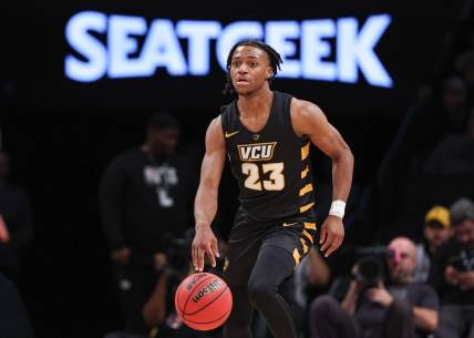 Nov 16, 2022; Brooklyn, New York, USA; Virginia Commonwealth Rams guard Jayden Nunn (23) dribbles up court  during the second half against the Arizona State Sun Devils at Barclays Center. Mandatory Credit: Vincent Carchietta-USA TODAY Sports