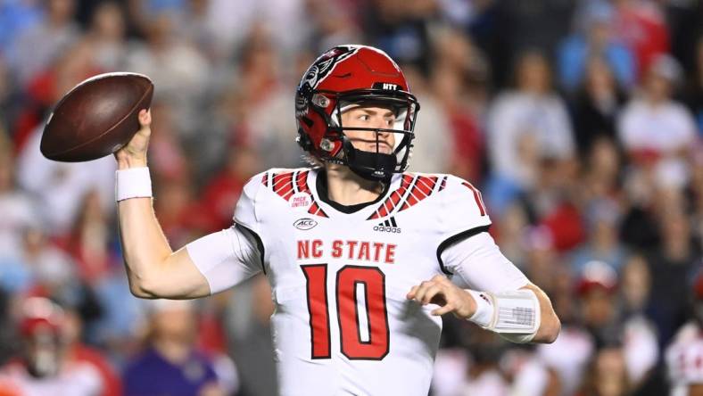 Nov 25, 2022; Chapel Hill, North Carolina, USA; North Carolina State Wolfpack quarterback Ben Finley (10) looks to pass in the fourth quarter at Kenan Memorial Stadium. Mandatory Credit: Bob Donnan-USA TODAY Sports