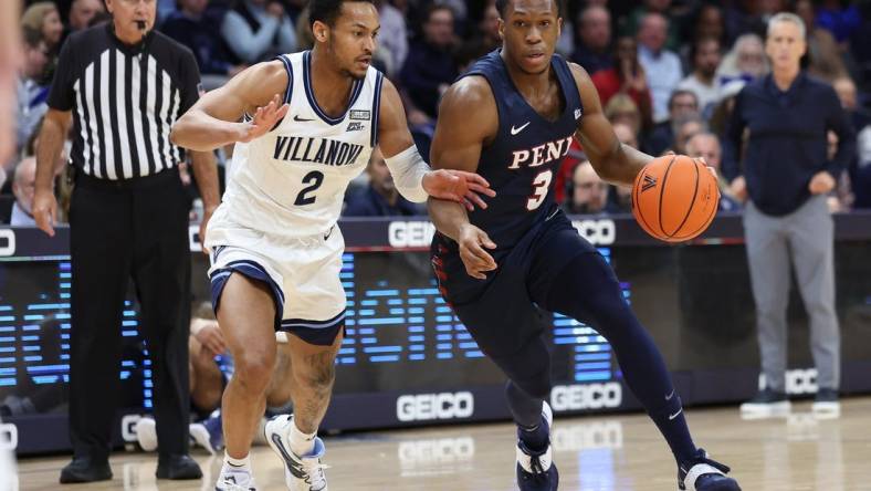 Dec 7, 2022; Villanova, Pennsylvania, USA; Pennsylvania Quakers guard Jordan Dingle (3) dribbles against Villanova Wildcats guard Mark Armstrong (2) during the first half at William B. Finneran Pavilion. Mandatory Credit: Bill Streicher-USA TODAY Sports