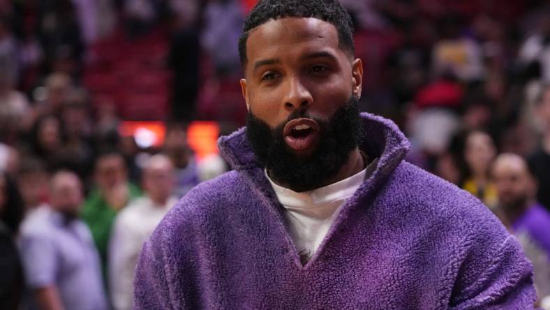 Dec 28, 2022; Miami, Florida, USA;  Football player Odell Beckham stands on the court after the game between the Miami Heat and the Los Angeles Lakers at FTX Arena. Mandatory Credit: Jasen Vinlove-USA TODAY Sports