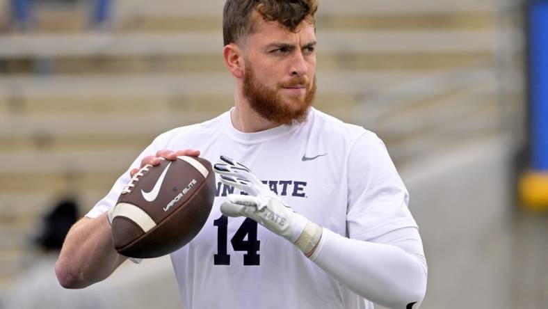 Jan 2, 2023; Pasadena, California, USA; Penn State Nittany Lions quarterback Sean Clifford (14) warms up before the game between the Utah Utes and the Penn State Nittany Lions at Rose Bowl. Mandatory Credit: Jayne Kamin-Oncea-USA TODAY Sports