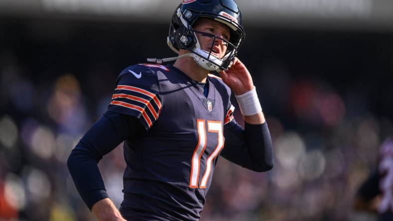 Jan 8, 2023; Chicago, Illinois, USA; Chicago Bears quarterback Tim Boyle (17) runs off the field during the second quarter against the Minnesota Vikings at Soldier Field. Mandatory Credit: Daniel Bartel-USA TODAY Sports