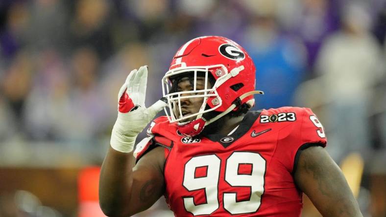 Jan 9, 2023; Inglewood, CA, USA; Georgia Bulldogs defensive lineman Bear Alexander (99) reacts after a play against the TCU Horned Frogs during the second quarter of the CFP national championship game at SoFi Stadium. Mandatory Credit: Kirby Lee-USA TODAY Sports