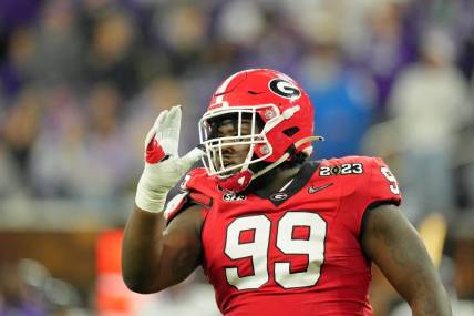 Jan 9, 2023; Inglewood, CA, USA; Georgia Bulldogs defensive lineman Bear Alexander (99) reacts after a play against the TCU Horned Frogs during the second quarter of the CFP national championship game at SoFi Stadium. Mandatory Credit: Kirby Lee-USA TODAY Sports