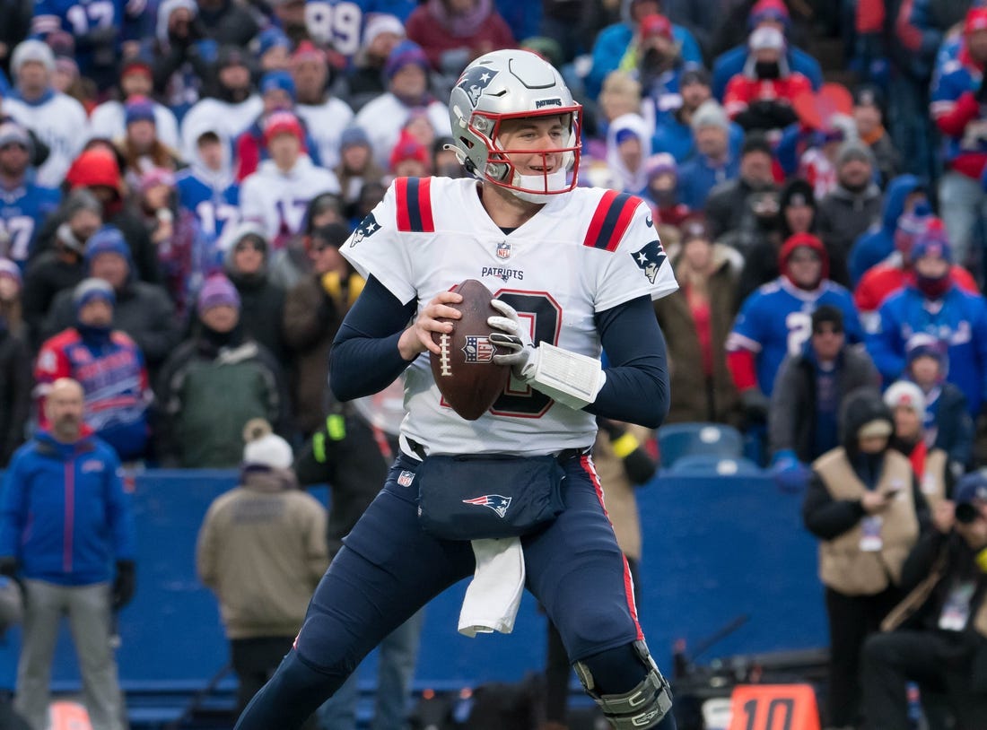 Jan 8, 2023; Orchard Park, New York, USA; New England Patriots quarterback Mac Jones (10) in the second quarter against the Buffalo Bills at Highmark Stadium. Mandatory Credit: Mark Konezny-USA TODAY Sports