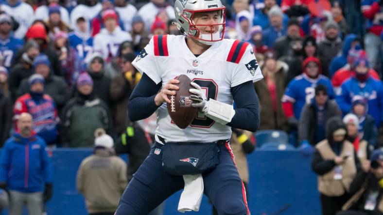 Jan 8, 2023; Orchard Park, New York, USA; New England Patriots quarterback Mac Jones (10) in the second quarter against the Buffalo Bills at Highmark Stadium. Mandatory Credit: Mark Konezny-USA TODAY Sports