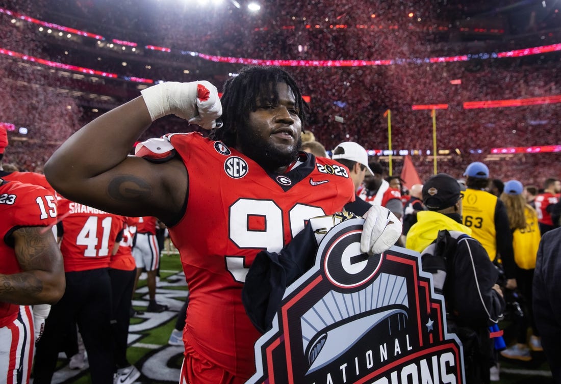 Jan 9, 2023; Inglewood, CA, USA; Georgia Bulldogs defensive lineman Bear Alexander (99) celebrates after defeating the TCU Horned Frogs during the CFP national championship game at SoFi Stadium. Mandatory Credit: Mark J. Rebilas-USA TODAY Sports