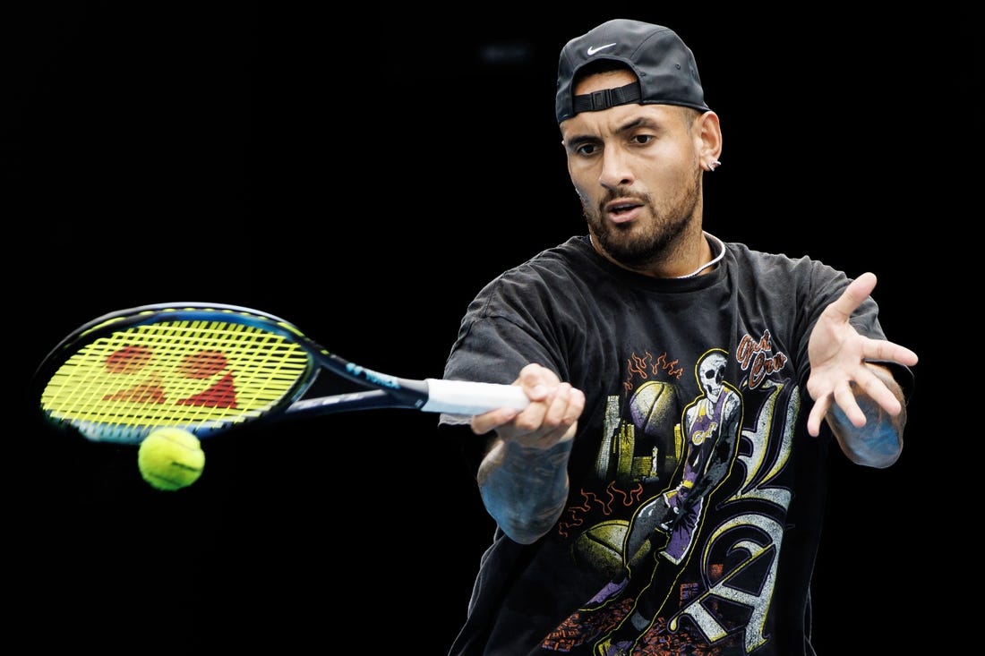 Jan 15, 2023; Melbourne, Victoria, Australia; Nick Kyrgios of Australia hits a shot during a practice session on court 16 at Melbourne Park. Mandatory Credit: Mike Frey-USA TODAY Sports