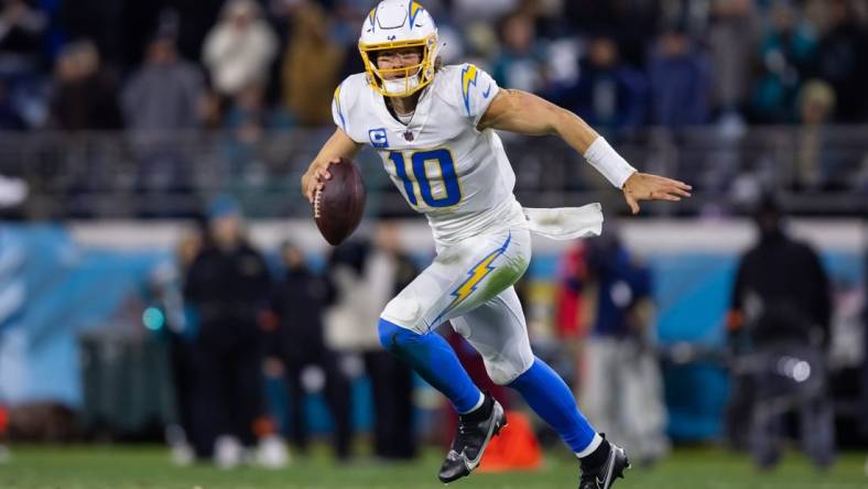 Jan 14, 2023; Jacksonville, Florida, USA; Los Angeles Chargers quarterback Justin Herbert (10) against the Jacksonville Jaguars during a wild card playoff game at TIAA Bank Field. Mandatory Credit: Mark J. Rebilas-USA TODAY Sports