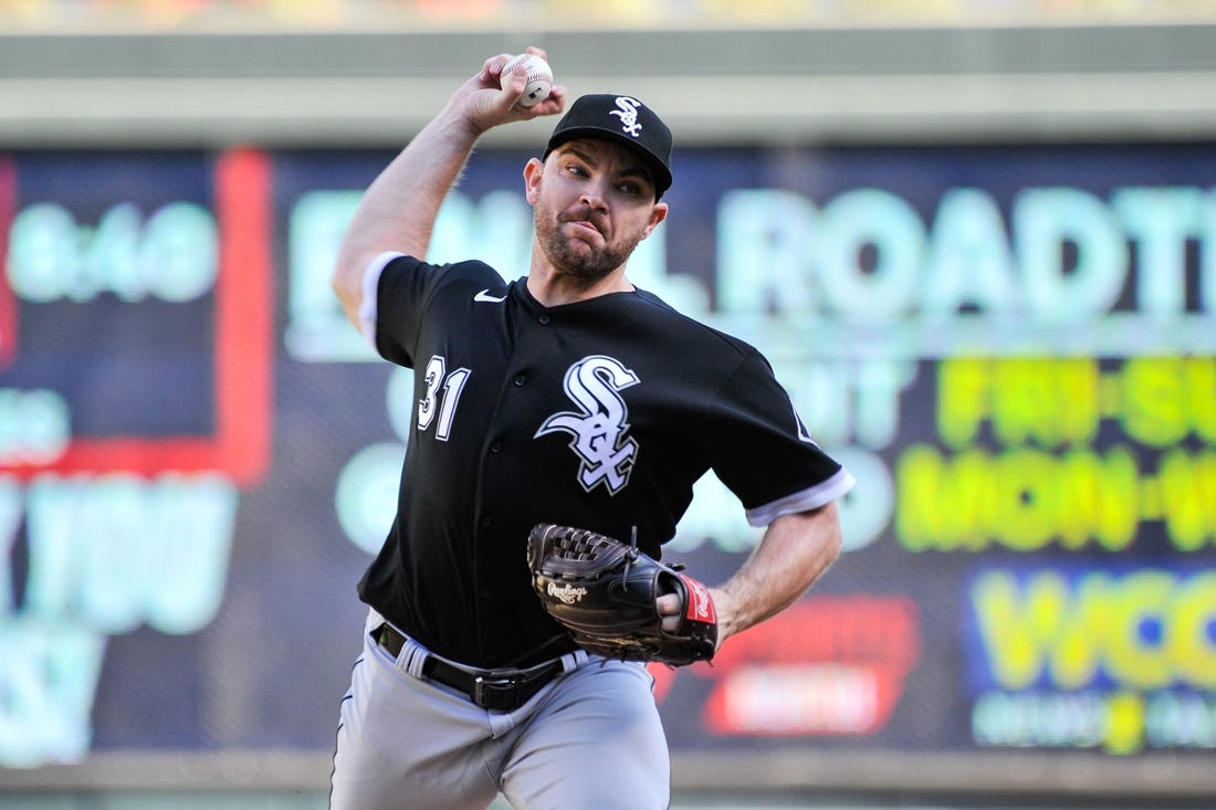 Sep 29, 2022; Minneapolis, Minnesota, USA; Chicago White Sox relief pitcher Liam Hendriks (31) throws a pitch against the Minnesota Twins during the ninth inning at Target Field. Mandatory Credit: Jeffrey Becker-USA TODAY Sports