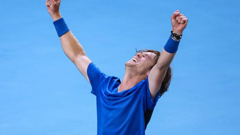 Jan 23, 2023; Melbourne, Victoria, Australia; Andrey Rublev from Russia celebrates during his round four match against Holger Rune from Denmark on day eight of the 2023 Australian Open tennis tournament at Melbourne Park. Mandatory Credit: Mike Frey-USA TODAY Sports