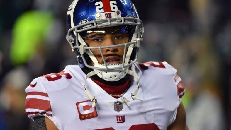 Jan 21, 2023; Philadelphia, Pennsylvania, USA; New York Giants running back Saquon Barkley (26) against the Philadelphia Eagles during an NFC divisional round game at Lincoln Financial Field. Mandatory Credit: Eric Hartline-USA TODAY Sports