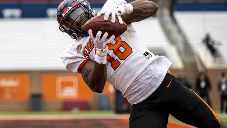 Feb 2, 2023; Mobile, AL, USA; American wide receiver Jonathan Mingo of Ole Miss (18) practices during the third day of Senior Bowl week at Hancock Whitney Stadium in Mobile. Mandatory Credit: Vasha Hunt-USA TODAY Sports