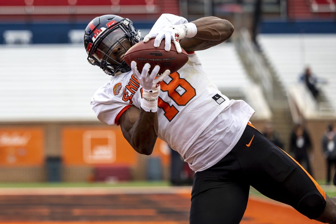 Feb 2, 2023; Mobile, AL, USA; American wide receiver Jonathan Mingo of Ole Miss (18) practices during the third day of Senior Bowl week at Hancock Whitney Stadium in Mobile. Mandatory Credit: Vasha Hunt-USA TODAY Sports