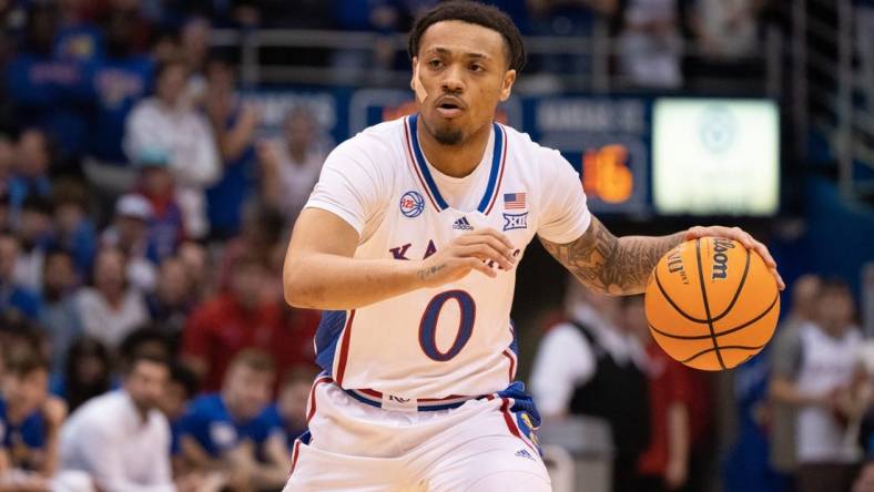 Kansas sophomore guard Bobby Pettiford Jr. (0) looks for an open pass in the first half of Tuesday's Sunflower Showdown against Kansas State inside Allen Fieldhouse.