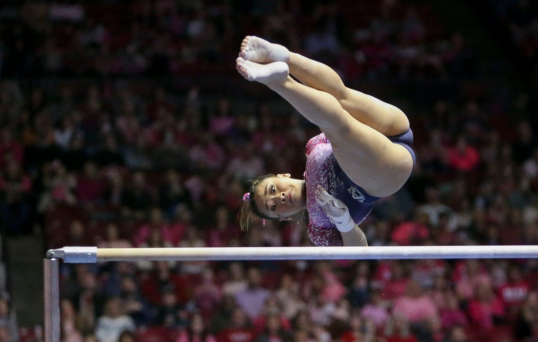 Feb 3, 2023; Tuscaloosa, AL, USA;  Auburn gymnast Suni Lee competes on the bars where she scored a perfect 10.0 at Coleman Coliseum. Alabama edged Auburn 197.850 to 197.700.

Ncaa Gymnastics Power Of Pink Meet Alabama Vs Auburn