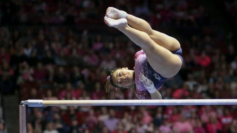 Feb 3, 2023; Tuscaloosa, AL, USA;  Auburn gymnast Suni Lee competes on the bars where she scored a perfect 10.0 at Coleman Coliseum. Alabama edged Auburn 197.850 to 197.700.

Ncaa Gymnastics Power Of Pink Meet Alabama Vs Auburn