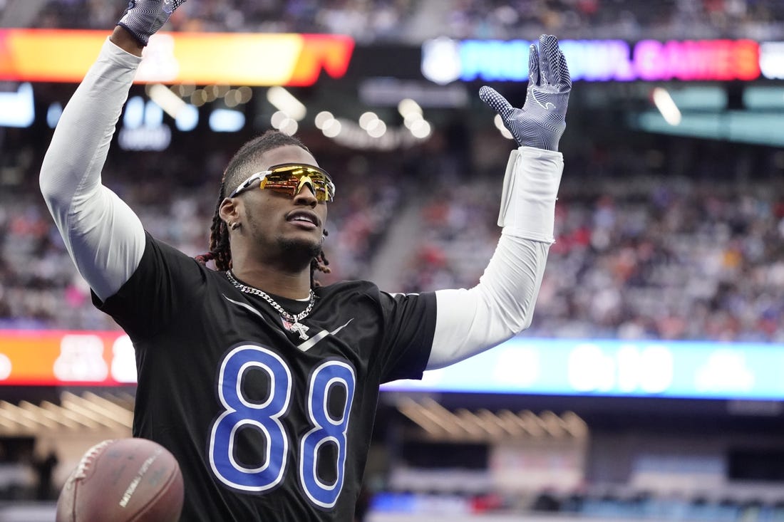 Feb 5, 2023; Paradise, Nevada, USA; NFC wide receiver CeeDee Lamb of the Dallas Cowboys (88) celebrates a touchdown against the AFC at the 2023 Pro Bowl at Allegiant Stadium. Mandatory Credit: Lucas Peltier-USA TODAY Sports