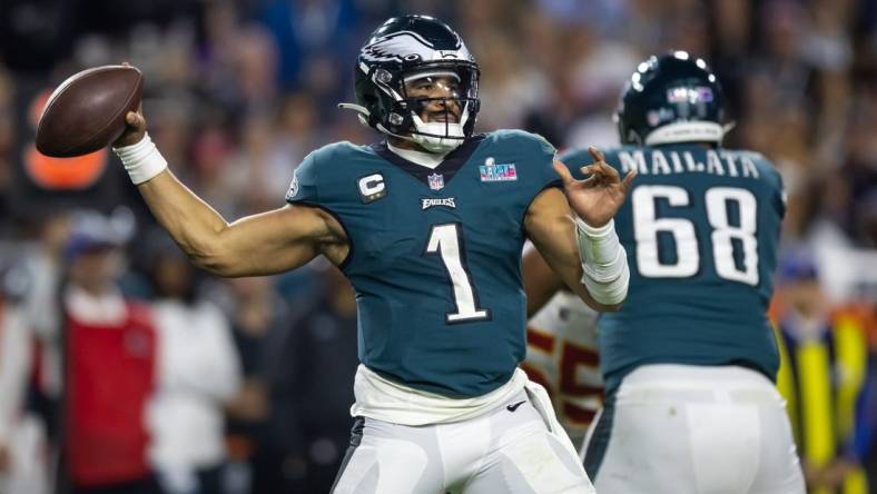 Feb 12, 2023; Glendale, Arizona, US; Philadelphia Eagles quarterback Jalen Hurts (1) against the Kansas City Chiefs during Super Bowl LVII at State Farm Stadium. Mandatory Credit: Mark J. Rebilas-USA TODAY Sports