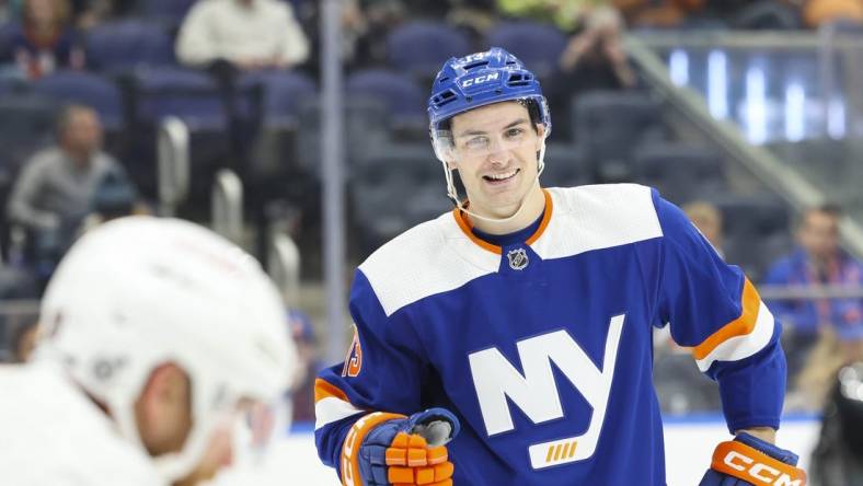 Feb 14, 2023; Elmont, New York, USA; New York Islanders center Mathew Barzal (13) reacts during the second period of a game against the Ottawa Senators at UBS Arena. Mandatory Credit: Jessica Alcheh-USA TODAY Sports