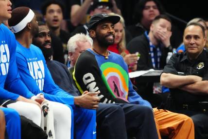 Feb 15, 2023; Denver, Colorado, USA; Dallas Mavericks guard Kyrie Irving (2) on the bench in the second quarter against the Denver Nuggets at Ball Arena. Mandatory Credit: Ron Chenoy-USA TODAY Sports