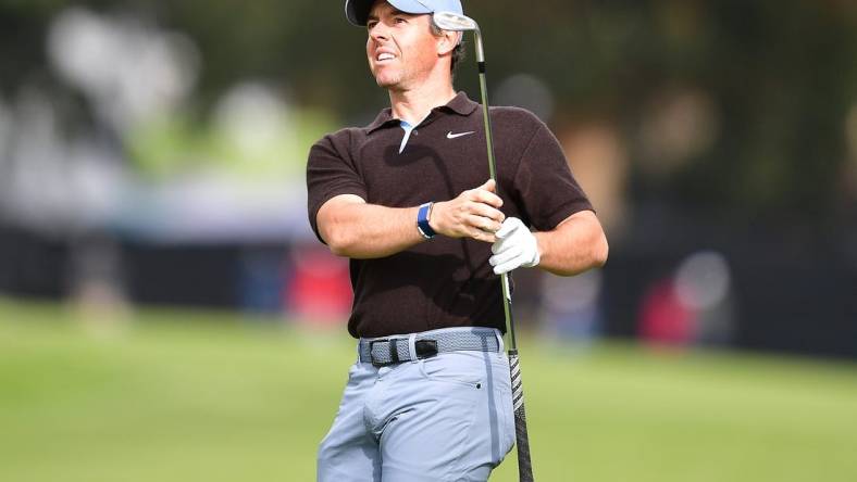 Feb 18, 2023; Pacific Palisades, California, USA; Rory McIlroy plays his shot on the fifteenth hole fairway during the third round of The Genesis Invitational golf tournament. Mandatory Credit: Gary A. Vasquez-USA TODAY Sports