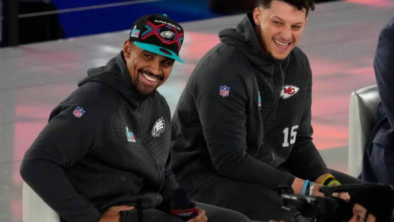 Philadelphia Eagles quarterback Jalen Hurts (1) and Kansas City Chiefs quarterback Patrick Mahomes (15) take the stage at the Footprint Center in downtown Phoenix during the NFL's Super Bowl Opening Night on Feb. 6, 2023.

Nfl Super Bowl Lvii Opening Night Kansas City Chiefs