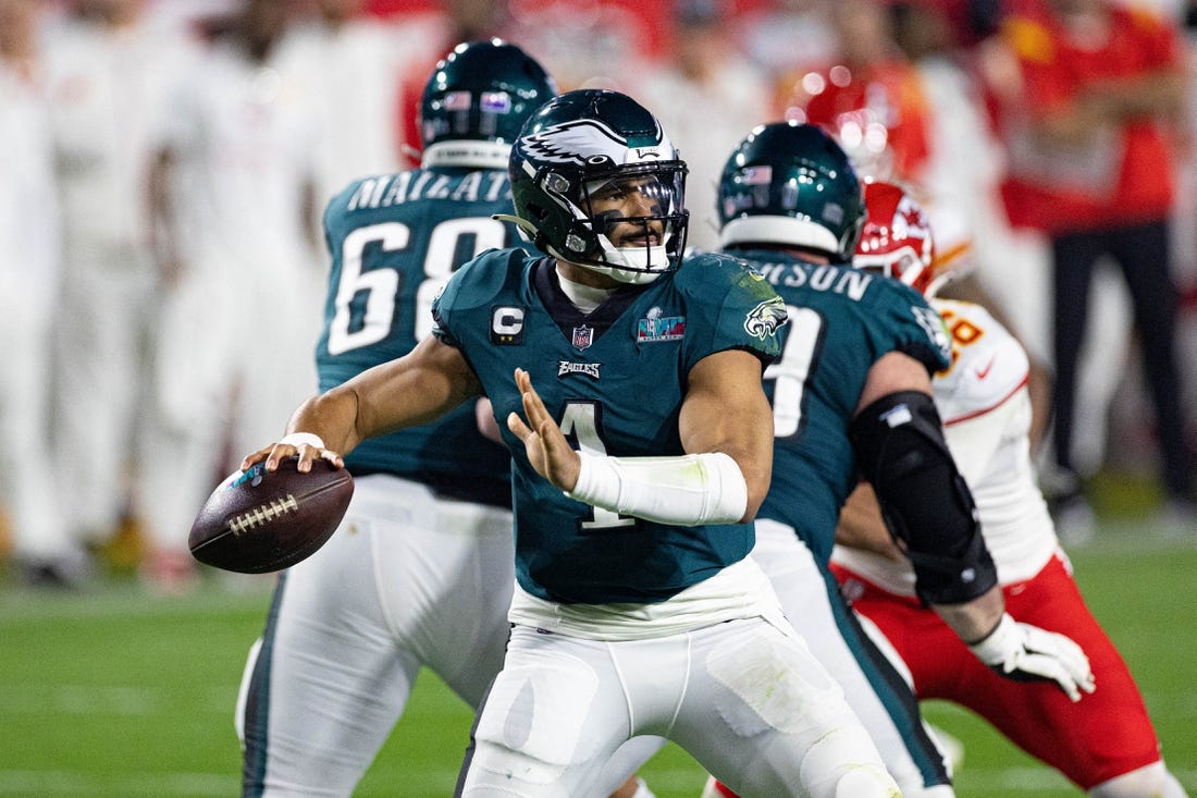 Feb 12, 2023; Glendale, Arizona, US; Philadelphia Eagles quarterback Jalen Hurts (1) throws the ball against the Kansas City Chiefs in Super Bowl LVII at State Farm Stadium. Mandatory Credit: Bill Streicher-USA TODAY Sports