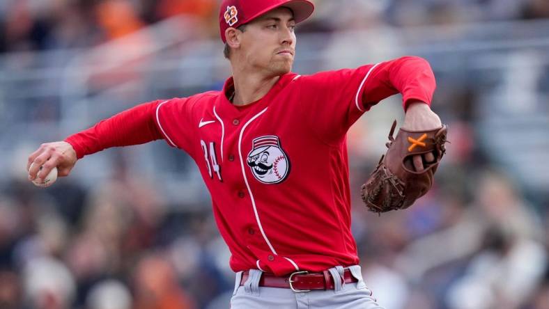 Cincinnati Reds relief pitcher Luke Weaver (34) throws a pitch in the first inning of the MLB Cactus League spring training game between the San Francisco Giants and the Cincinnati Reds at Scottsdale Stadium in Goodyear, Ariz., on Sunday, Feb. 26, 2023. The Giants came back in the ninth inning to win on a walk-off single off the bat of Will Wilson.

Cincinnati Reds At San Francisco Giants Spring Training