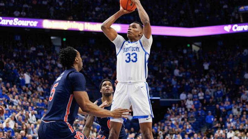 Feb 25, 2023; Lexington, Kentucky, USA; Kentucky Wildcats forward Ugonna Onyenso (33) shoots the ball during the second half against the Auburn Tigers at Rupp Arena at Central Bank Center. Mandatory Credit: Jordan Prather-USA TODAY Sports