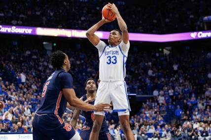 Feb 25, 2023; Lexington, Kentucky, USA; Kentucky Wildcats forward Ugonna Onyenso (33) shoots the ball during the second half against the Auburn Tigers at Rupp Arena at Central Bank Center. Mandatory Credit: Jordan Prather-USA TODAY Sports
