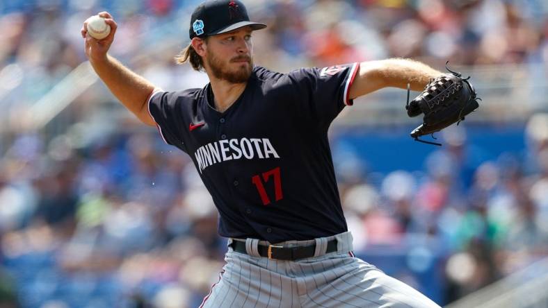 Mar 8, 2023; Dunedin, Florida, USA;  Minnesota Twins starting pitcher Bailey Ober (17) throws a pitch against the Toronto Blue Jays in the first inning during spring training at TD Ballpark. Mandatory Credit: Nathan Ray Seebeck-USA TODAY Sports