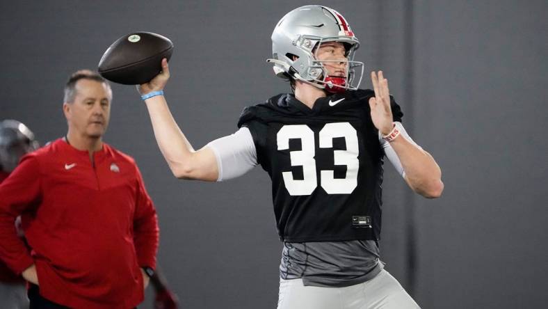 Mar 9, 2023; Columbus, Ohio, USA;  Ohio State Buckeyes quarterback Devin Brown (33) throws during spring football practice at the Woody Hayes Athletic Center. Mandatory Credit: Adam Cairns-The Columbus Dispatch

Football Buckeyes Spring Football