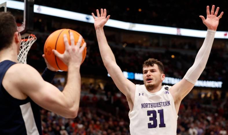 Northwestern Wildcats forward Robbie Beran (31) defends an inbounds pass during the Big Ten Men   s Basketball Tournament game against the Penn State Nittany Lions, Friday, March 10, 2023, at United Center in Chicago. Penn State won 67-65 in overtime.

Norpsu031023 Am16906