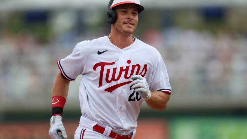 Mar 13, 2023; Fort Myers, Florida, USA;  Minnesota Twins right fielder Max Kepler (26) round the bases after hitting a home run against the New York Yankees in the fourth inning during spring training at Hammond Stadium. Mandatory Credit: Nathan Ray Seebeck-USA TODAY Sports