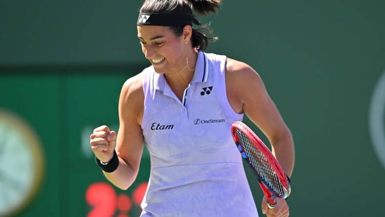 Mar 13, 2023; Indian Wells, CA, USA;  Caroline Garcia (FRA) celebrates after defeating Leylah Fernandez (CAN) in her fourth round match during the BNP Paribas Open at the Indian Wells Tennis Garden. Mandatory Credit: Jayne Kamin-Oncea-USA TODAY Sports