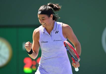 Mar 13, 2023; Indian Wells, CA, USA;  Caroline Garcia (FRA) celebrates after defeating Leylah Fernandez (CAN) in her fourth round match during the BNP Paribas Open at the Indian Wells Tennis Garden. Mandatory Credit: Jayne Kamin-Oncea-USA TODAY Sports